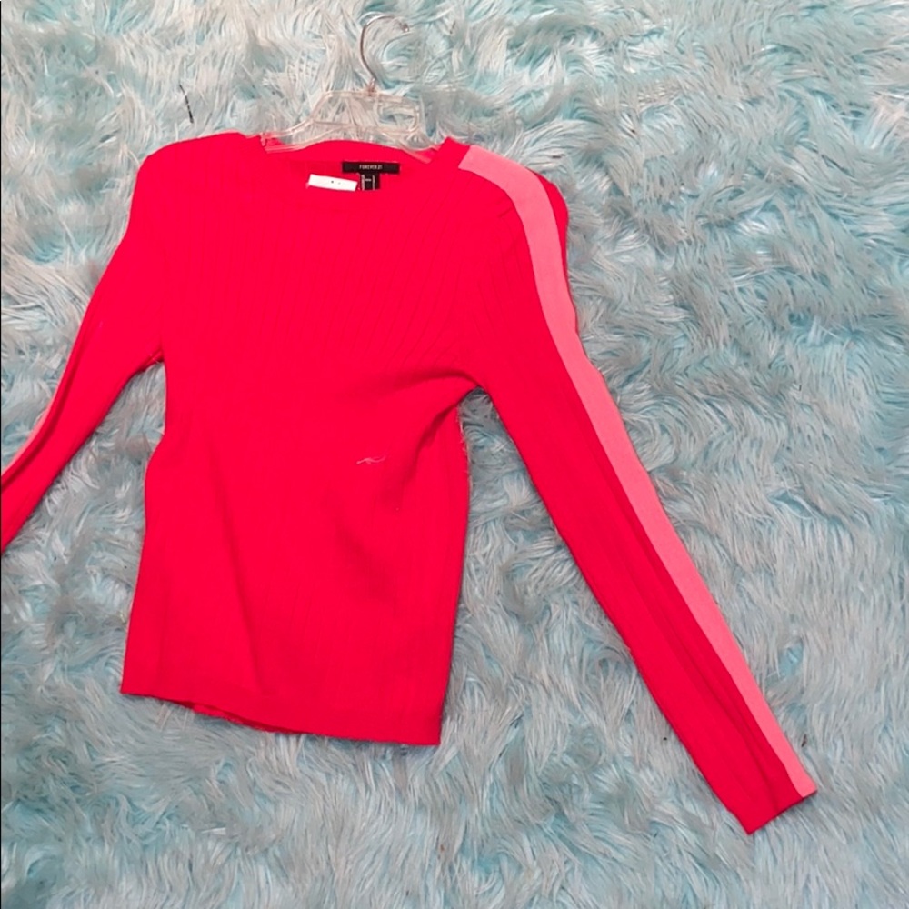 A red and pink sweater